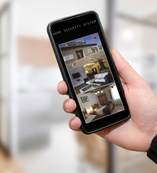 home-security-cameras-viewed-on-mobile-phone-2023-11-27-05-10-59-utc